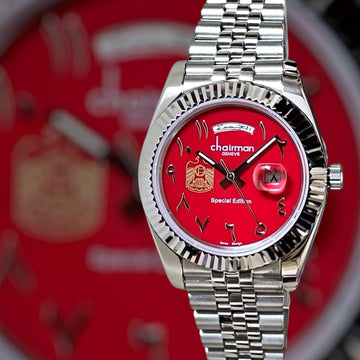 UAE Emblem Chairman Geneve Day And Dated Red Dial Silver Chain Gents Watch